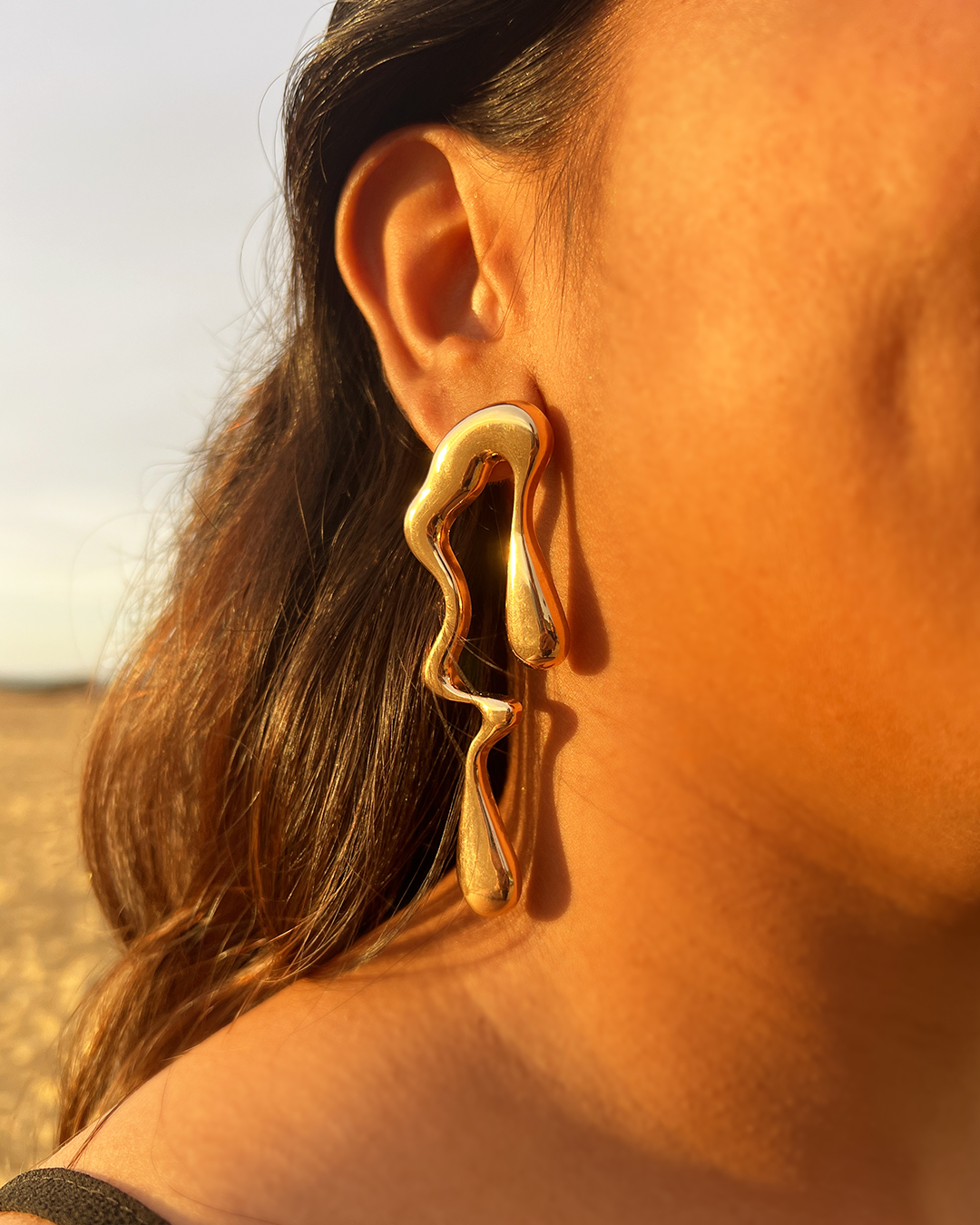 Asymmetric Liquid Metal-Style Drop Earring - Image 2